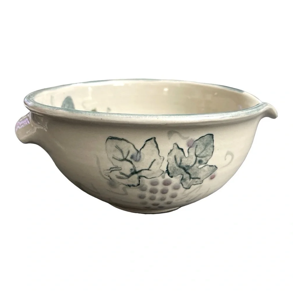 Handmade Bowl w/ Grape vines/ leaves. Singed by artist. Handle/ lip for pouring